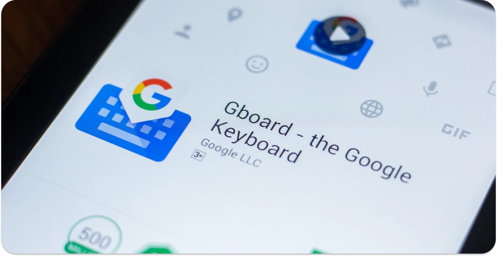 Close-up of Gboard app on a smartphone screen, a popular dictation tool by Google.
