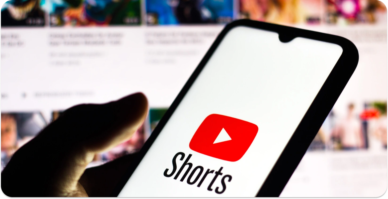 Smartphone with YouTube Shorts logo, representing the transcription of short-form videos.
