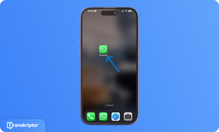 Schermata iniziale del telefono cellulare che mostra l'icona dell'app WhatsApp con una freccia blu che la indica